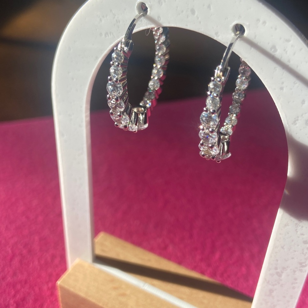 Sale! Elegant White Platinum Hoop Earrings with 3.76 Cubic Zirconia stones.